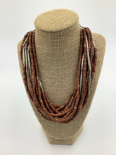 Load image into Gallery viewer, Bauxite Beads Necklace with Silver Tubular Tuareg Beads from Mali